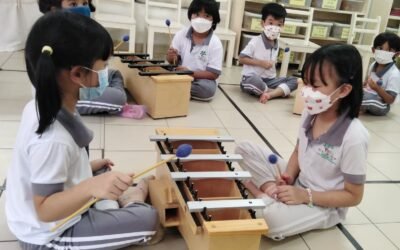 Playing musical instruments in Montessori class
